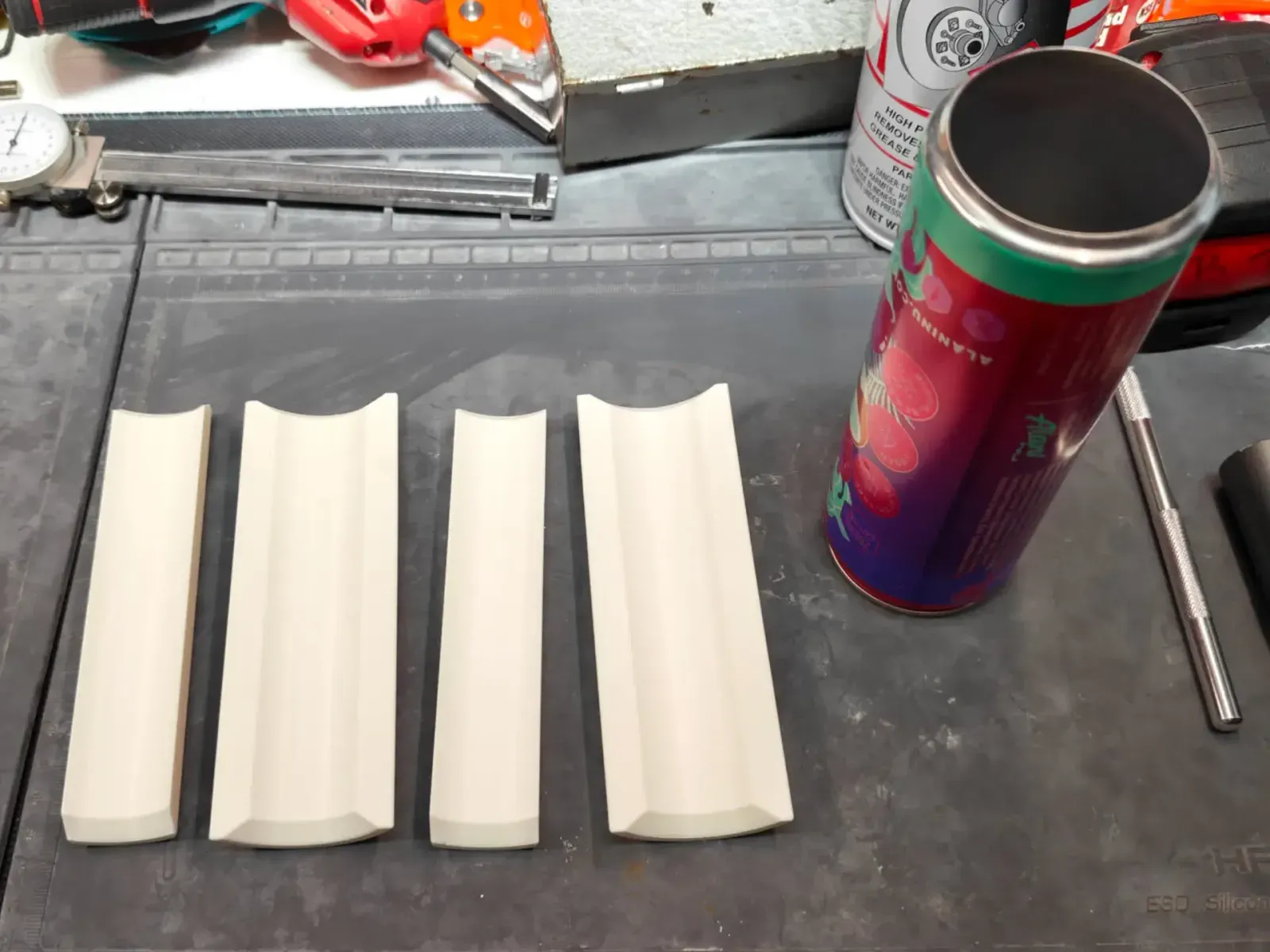 The four printed cells alongside the prepped can