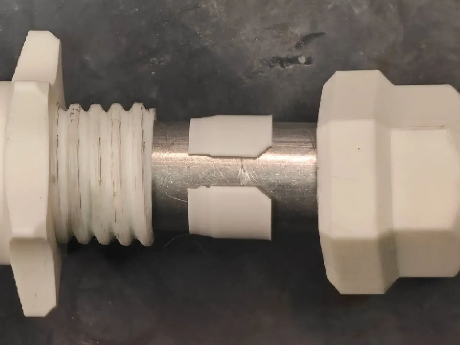 Point the chamfered end of the Barrel Collet towards the blaster