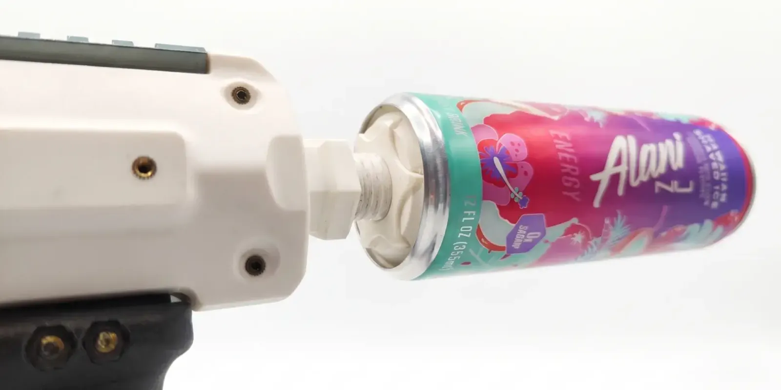 The can sliding onto the printed mount at the muzzle