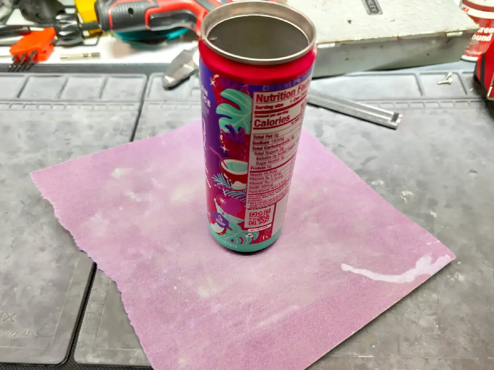 Sandpaper flat on the desk, can held upright on top of it